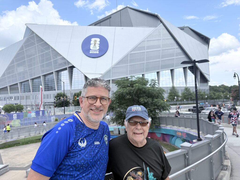 Instructor, Rwany Sibaja, with his father at a World Cup game held in Atlanta, Georgia on June 27 2026